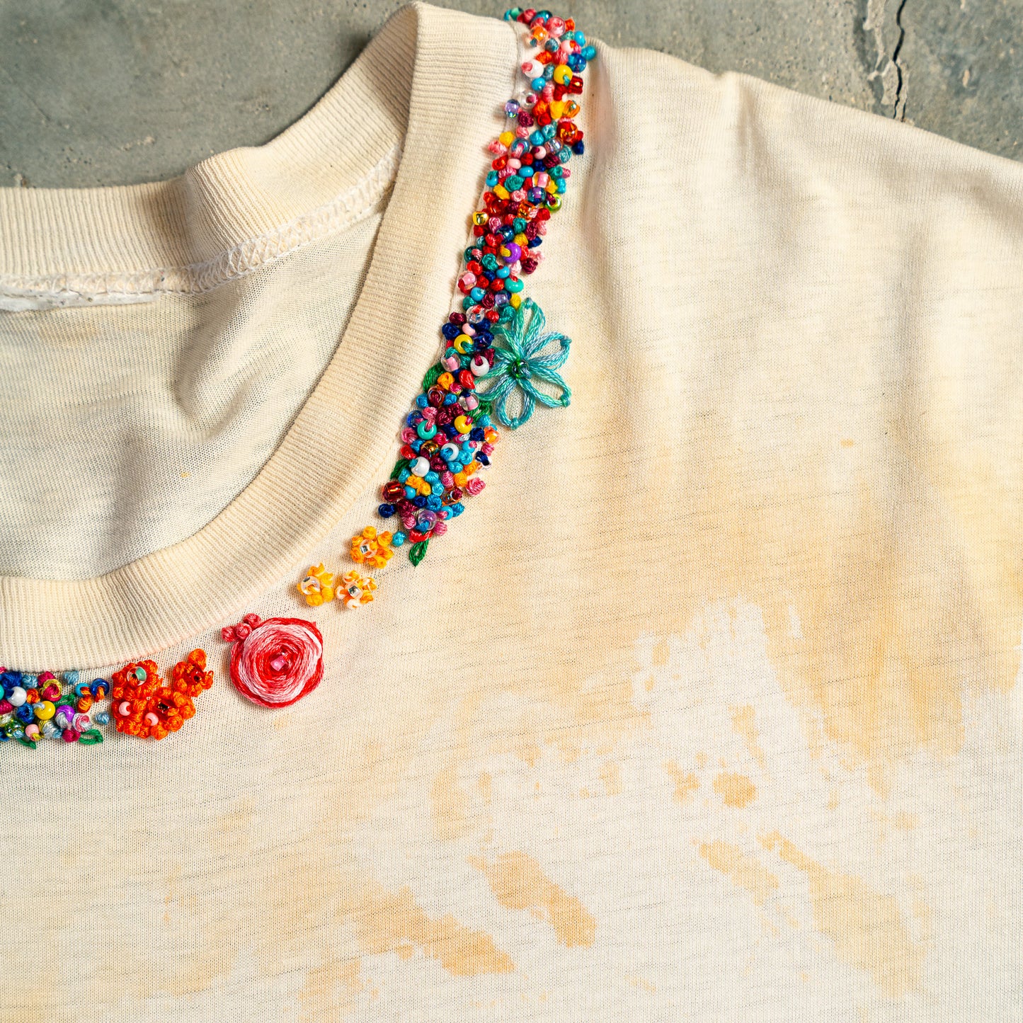 Vintage plain, coffee stained tee with new hand embroidered flowers