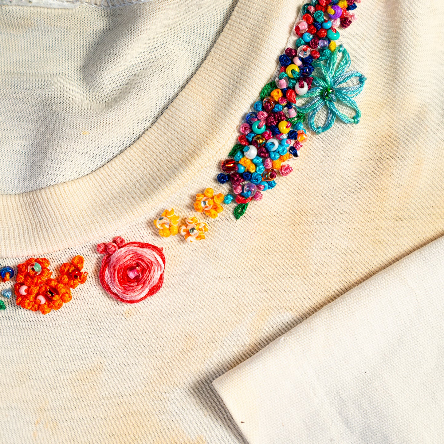 Vintage plain, coffee stained tee with new hand embroidered flowers